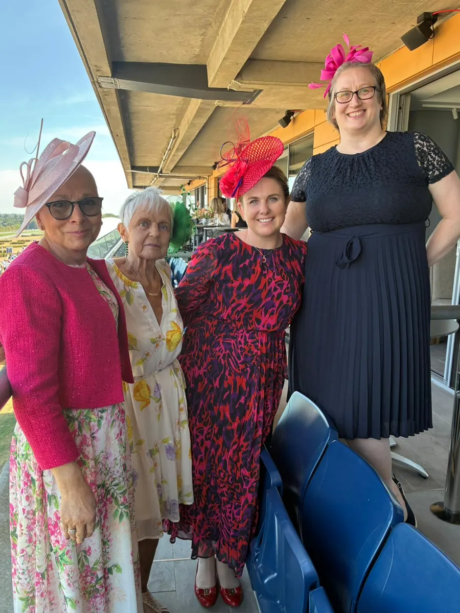 Guests in hats and fascinators at the Living Like Linda day at Ascot