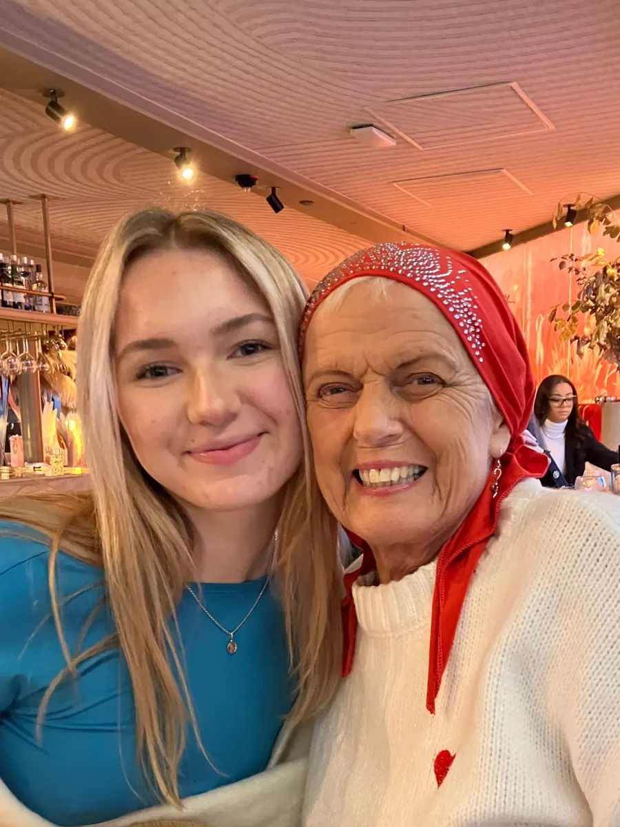Linda sharing a selfie with a young woman