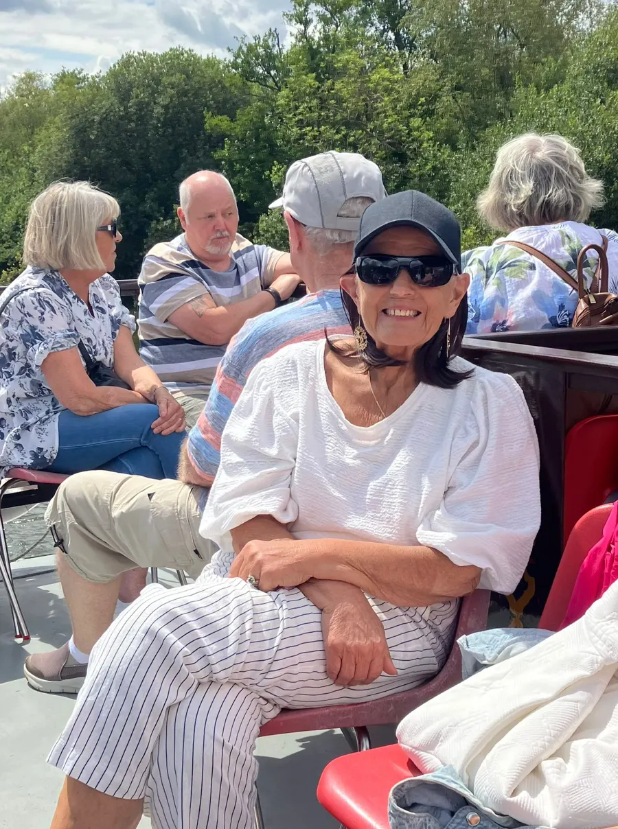 Linda relaxing in the sunshine with friends